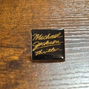 Black and Gold Signature Enamel Pin